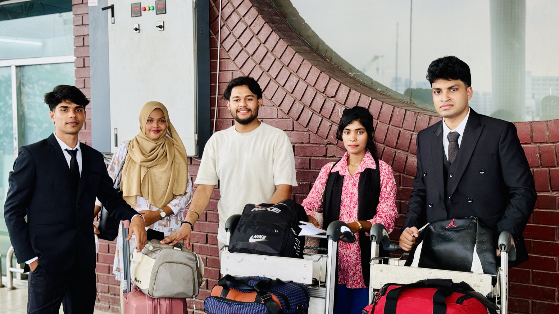Candidates ready for their journey with luggage
