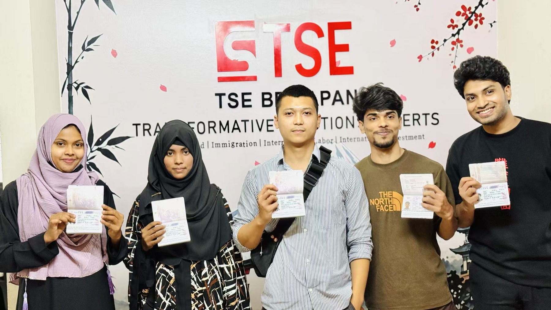 Group celebrating a milestone at the TSE office
