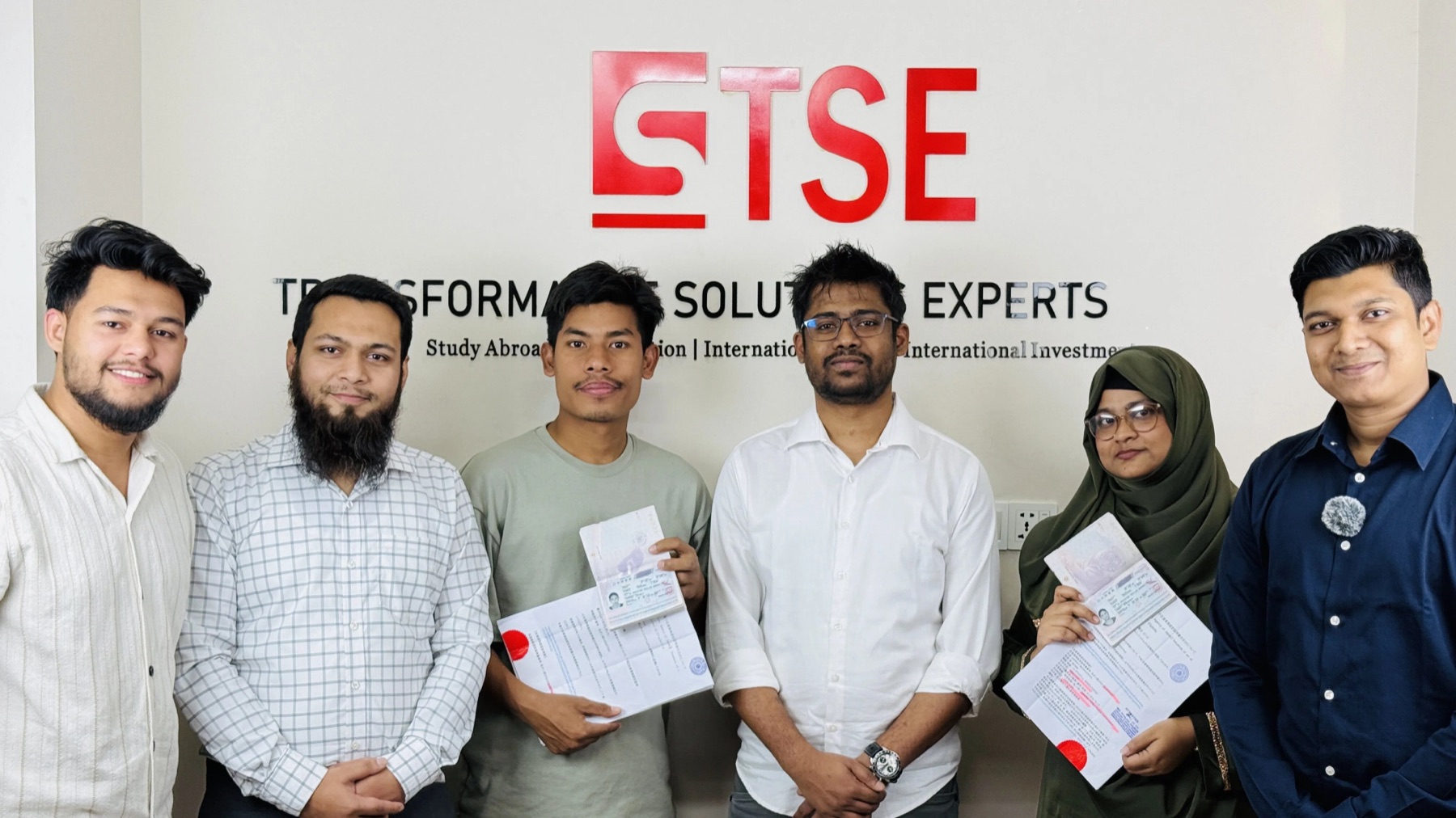 Candidates and advisors celebrating at TSE